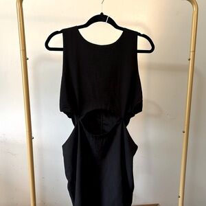 Black cutout dress by Kourt